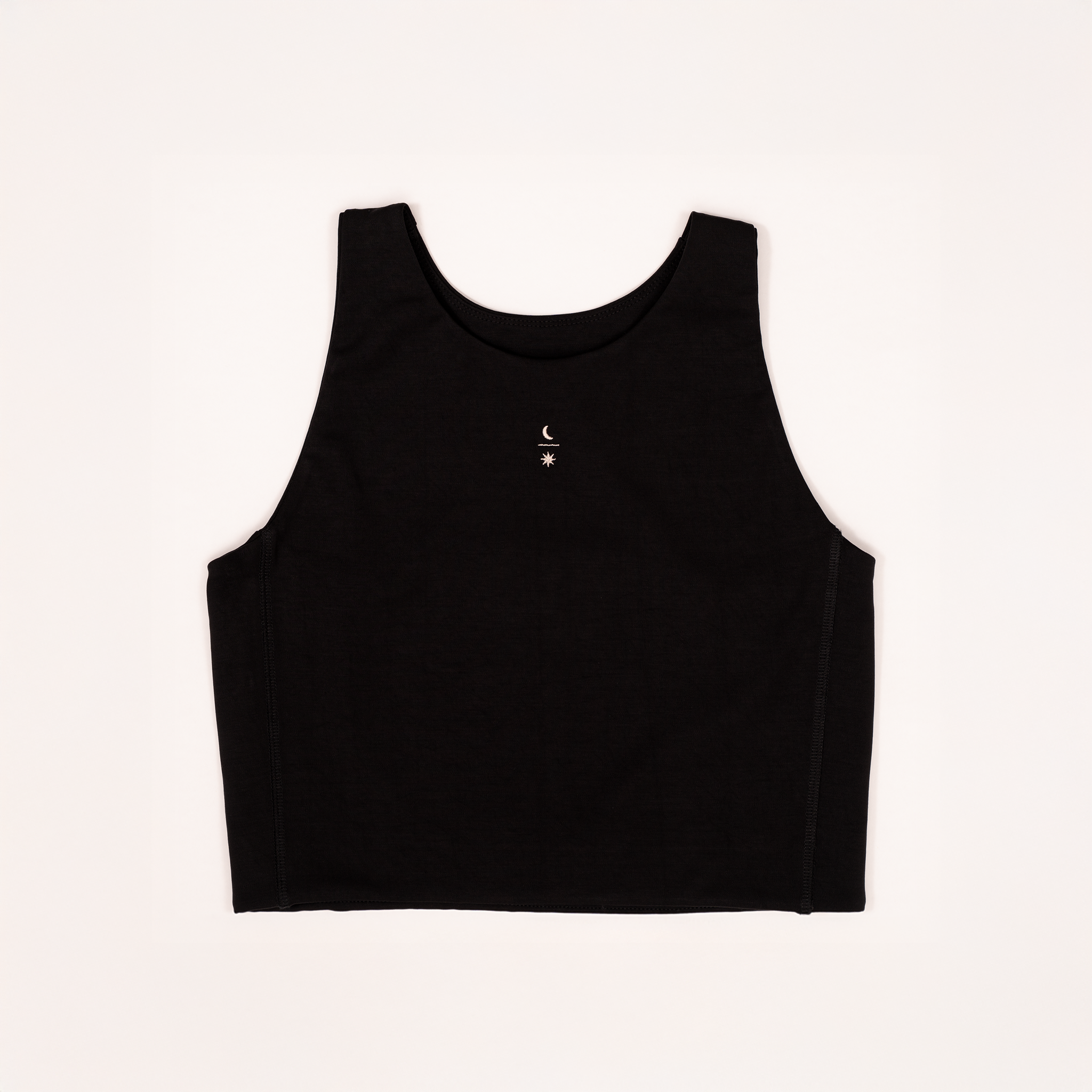 Front view of model wearing the Ainé sustainable activewear top made from Tencel